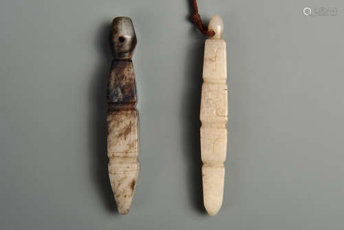 PAIR WHITE AND RUSSET JADE AMULETS HAN DYNASTY