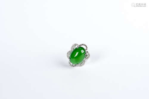 A JADEITE AND DIAMOND RING