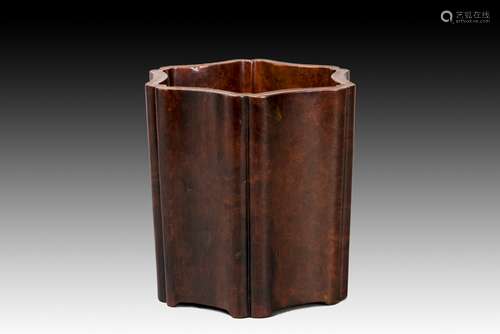 A WOODEN BRUSH POT