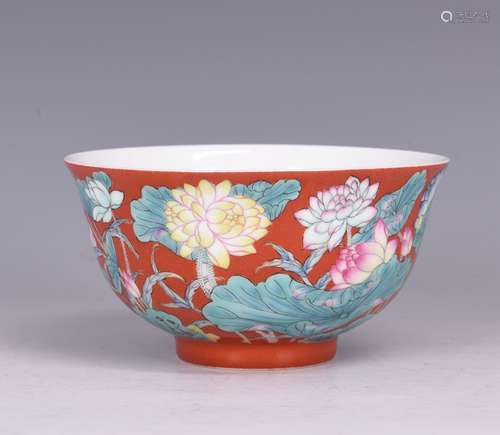 A RUBY RED GROUND FALANGCAI 'LOTUS' BOWL, QING DYNASTY, KANGXI PERIOD