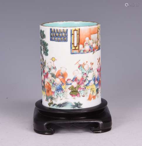 A FAMILLE ROSE 'HUNDRED BOYS' BRUSH POT, QING DYNASTY, JIAQING PERIOD