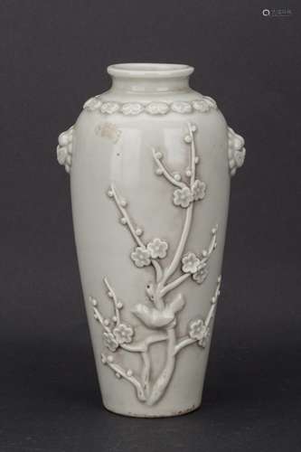 A RELIEF PATTERN WHITE PORCELAIN PLUM VASE