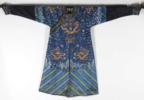 A CHINESE BLUE SILK EMBROIDERED DRAGON ROBE