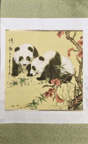 A CHINESE SCROLL PAINTING OF PANDA