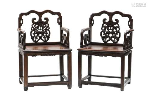 A PAIR OF 'LONGEVITY' ARM CHAIRS