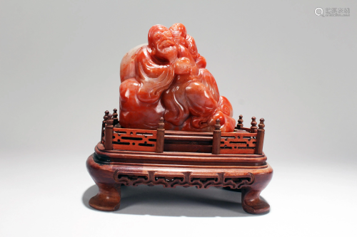 An Estate Chinese Elder-portrait Red Soapstone Statue