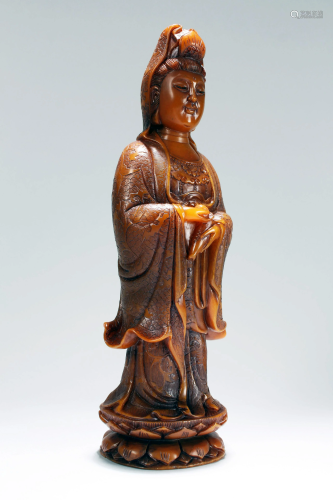 A Chinese Loctus-seated Religious Soapstone Fortune