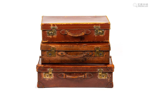 THREE VINTAGE LEATHER SUITCASES