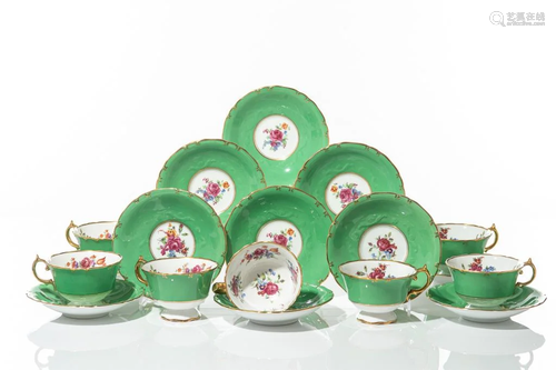 TWELVE JACKSON & GOSLING FLORAL CUPS AND SAUCERS