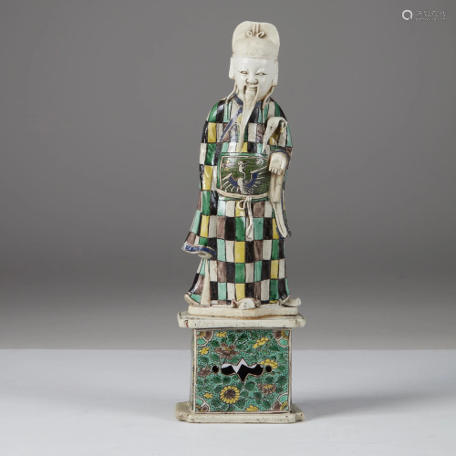 A Chinese famille verte porcelain figure of a deity,