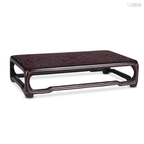 A Tixi type carved lacquered stand,