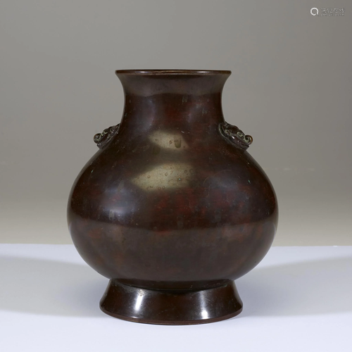 A Chinese archaistic patinated bronze vase, 18th/…