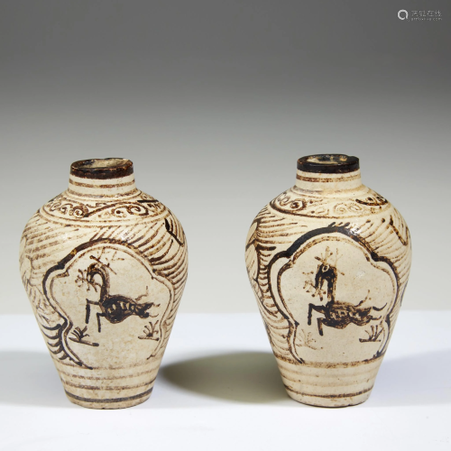 An associated pair of small Jizhou iron-brown decor…