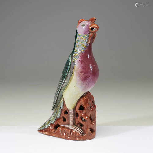 A Chinese rose-verte enameled porcelain phoenix,