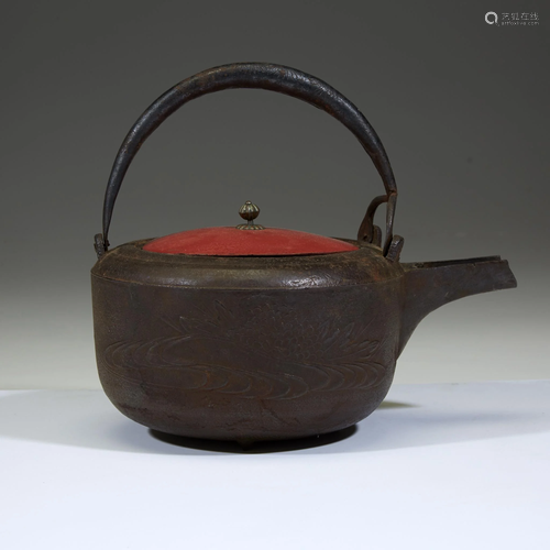 A Japanese cast iron kettle and a cast iron hibachi,