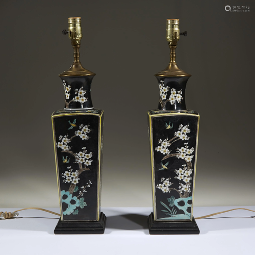 A pair of famille noir-decorated porcelain vases