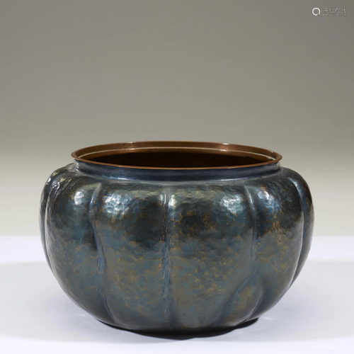 A Japanese hammered and patinated metal bowl, sig…