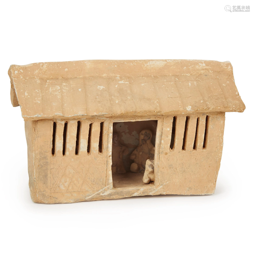 A Chinese red pottery model of a house, Han dynasty