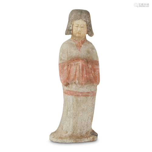 A Chinese painted pottery figure of a female att…