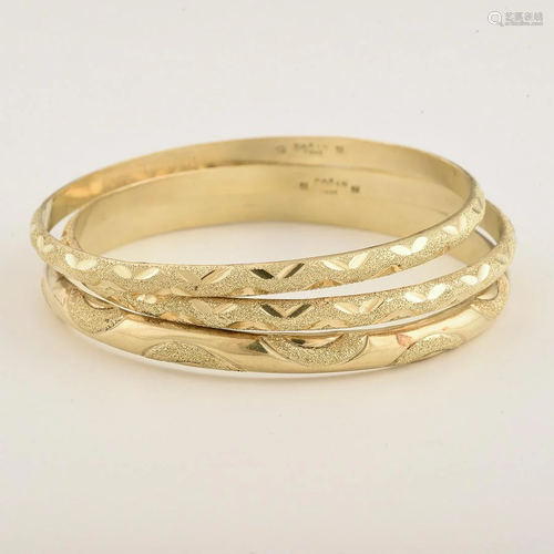 Collection of Three 14k Yellow Gold Bangle Bracelets.