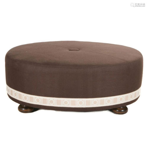 Contemporary Oval Upholstered Ottoman.
