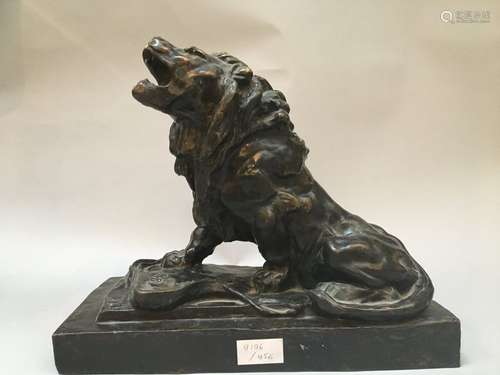 Lion sitting in bronze