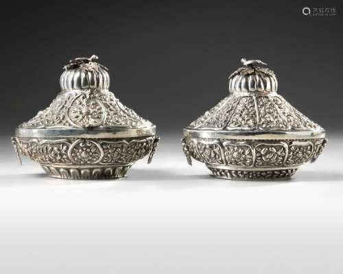 A PAIR OF OTTOMAN SILVER REPOUSSÉ LIDDED BOXES