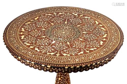 A WOODEN AND BONE INLAID TABLE