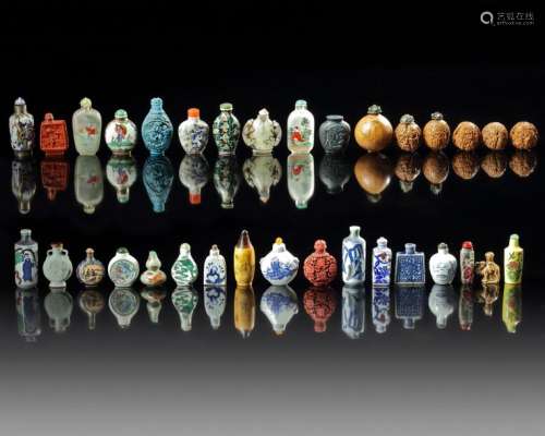 A GROUP OF THIRTY CHINESE SNUFF BOTTLES AND THREE …