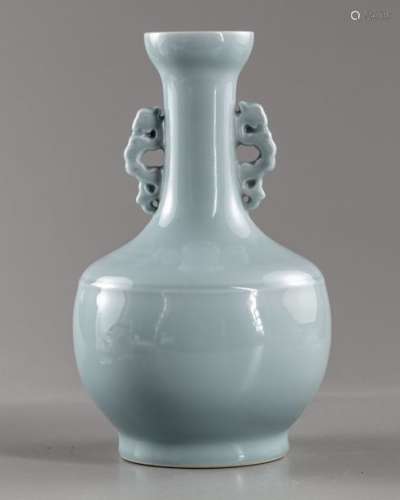 A CHINESE CELADON BOTTLE VASE