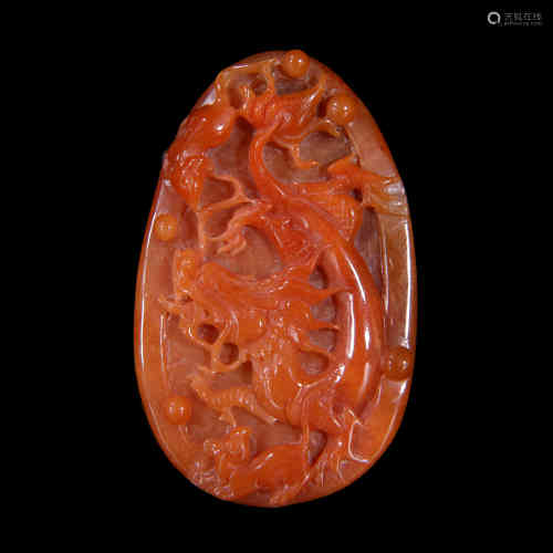 A Chinese Red Jadeite Plaque