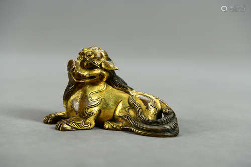 A Chinese Bronze Gilding Mat Weight