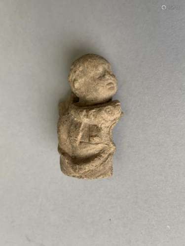 Buste d'enfant en terre cuite. Hauteur 5.2 cm. Epoque romaine IIème -IIIème siècle [...]