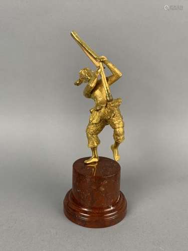 Sujet d'un joueur de musique traditionnel en bronze doré sur socle de marbre [...]