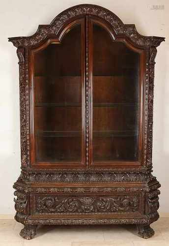 Heavy German oak inserted showcase with faceted glass. Italian style. Circa 1930. Slight damage.