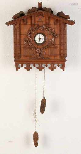 Schwarzwalder oak carved wall clock Lenzkirch travel alarm clock and decorative wooden weights.