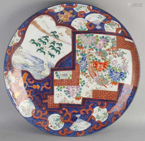 Particularly large 19th century Japanese Imari porcelain decorative plate with birds of paradise /