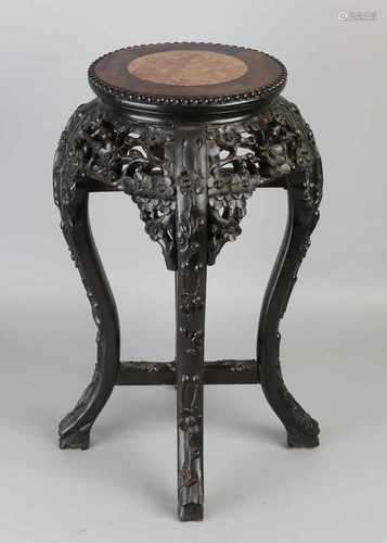 Antique Chinese wood put footstool with floral carvings and marble top. Dimensions: H 52 x Ø 28