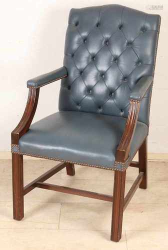 Mahogany armchair with blue / green leather trim and brass nails. 20th century. Size: 105 x 61 x