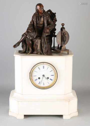 19th Century French white marble mantel clock with bronze figure. Jorini Freres and Co. a Paris.