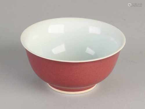 Chinese porcelain bowl with red matte glaze and six signs bottom mark. Size: 5.5 x 11.5 cm dia. In