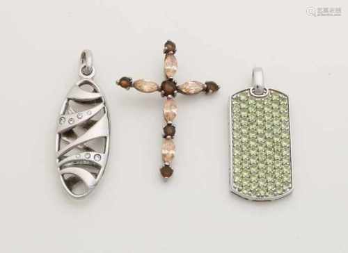 Three silver pendants, 925/000, occupies a rectangular model with green zirconia, occupied a cross