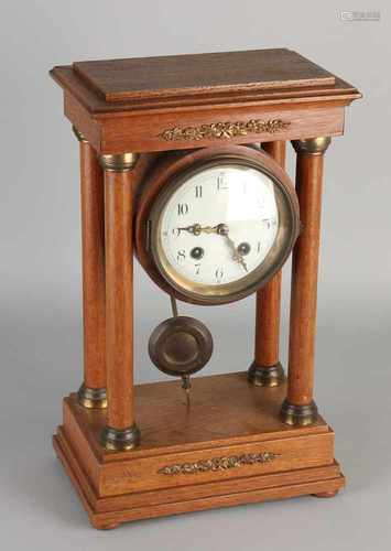 Antique oak pedestal clock with brass decorations. Circa 1900. Josephientje. Eight day-movement,