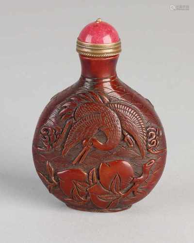 Ancient stone carved Chinese snuff bottle with crane decor and peaches. 20th century. Size: 8.5