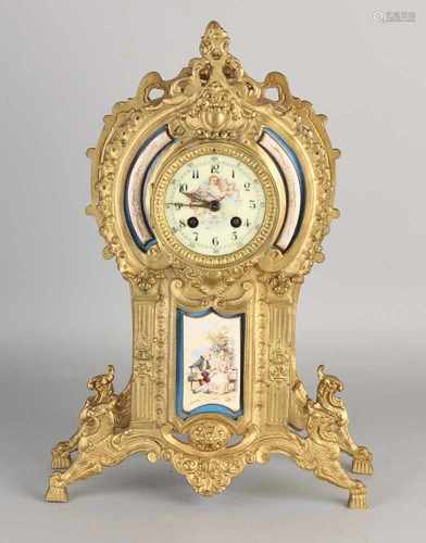 Antique French Louis Philippe gilt clock with hand-painted pottery plaques. Signed A. Couvin.