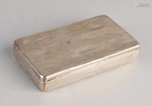 Silver tobacco box, 833/000, rectangular model with ribbewerking. Provided with engraving on the