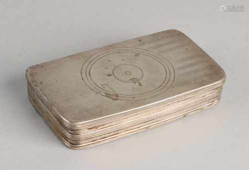 An early 19th century silver tobacco box, 833/000, rectangular shape with rib edges and engraving.