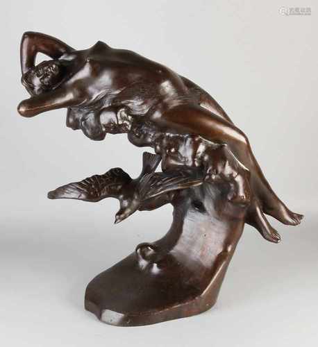 Big old Art Nouveau-style bronze figure. Naked woman with bird. Second half 20th century. Size: 55 x