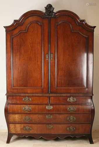 18th Century Dutch mahogany Rococo cabinet with beautiful bronze fittings and five drawers. Circa