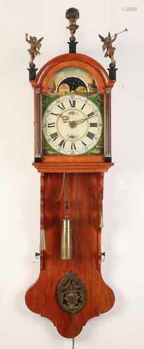 Oak Frisian clock with moon phase, date and alarm. First half 20th century. Size: 140 cm. In good